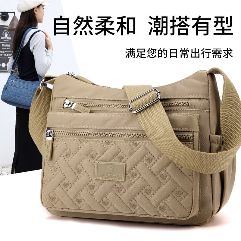 Bolsa feminina novo estilo náilon ombro mensageiro saco de meia-idade mãe saco de lona feminino grande capacidade Multi-