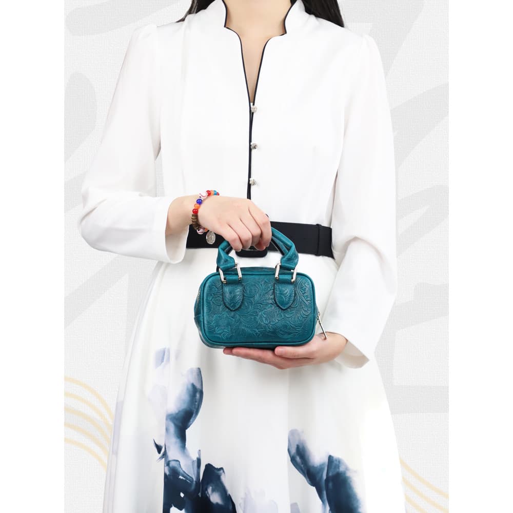Estilo chinês Tangcao padrão primeira camada de couro Mini bolsa senhoras nicho saco de armazenamento de cosméticos cour