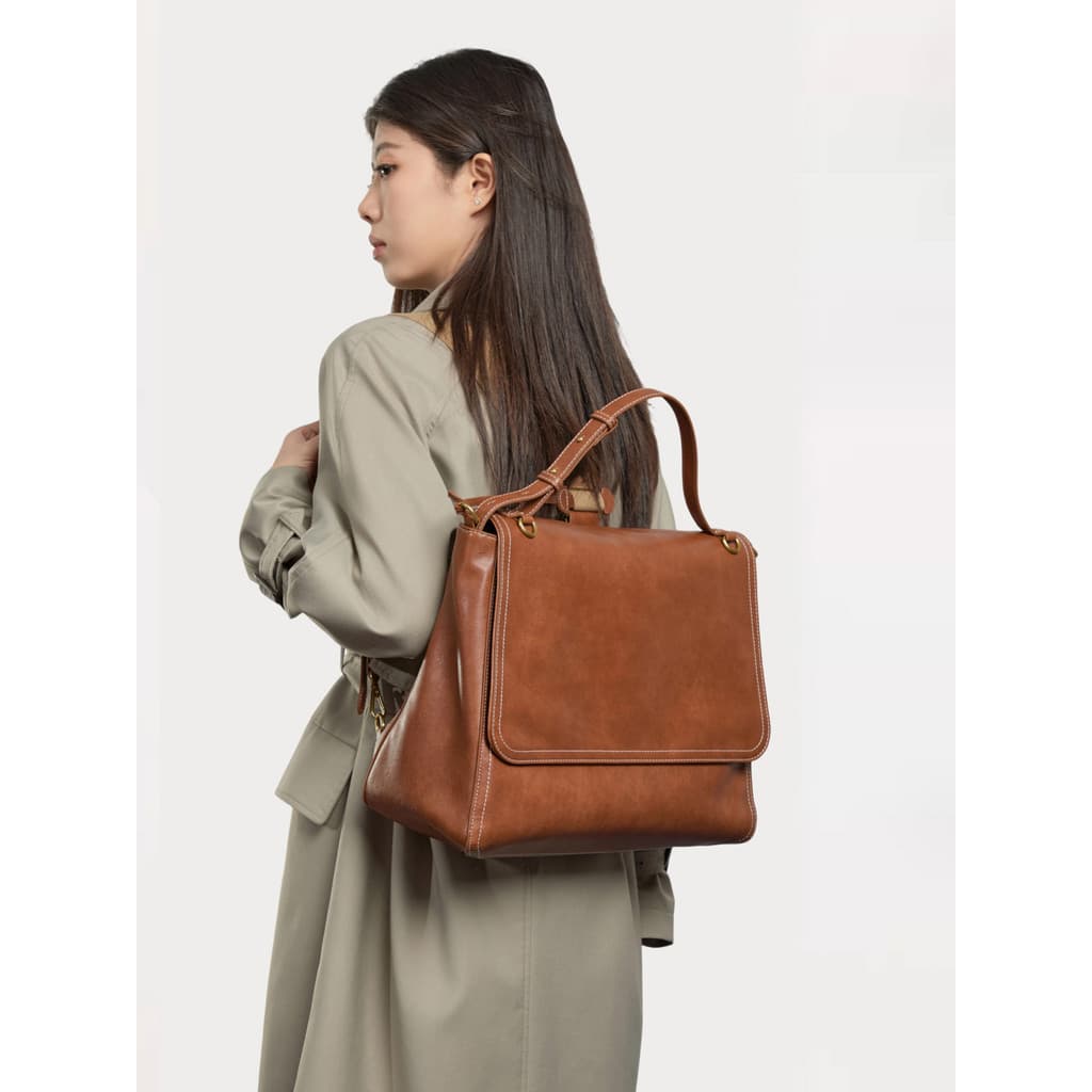 High-End nicho mochila feminina 2026 novo estilo de couro grande capacidade trabalho Commuter ombro mensageiro mochila d
