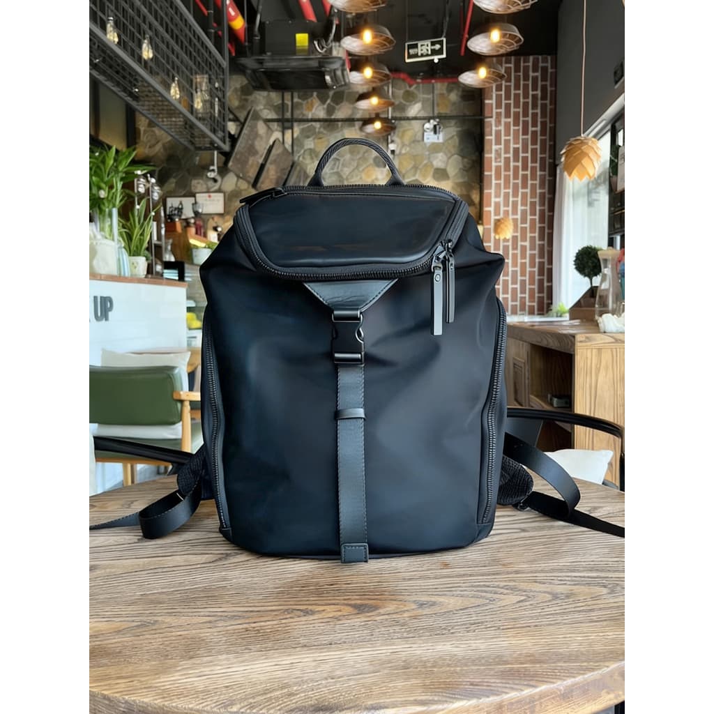 Pano impermeável com primeira camada de couro Retro mochila das mulheres dos homens Commuter grande capacidade computado