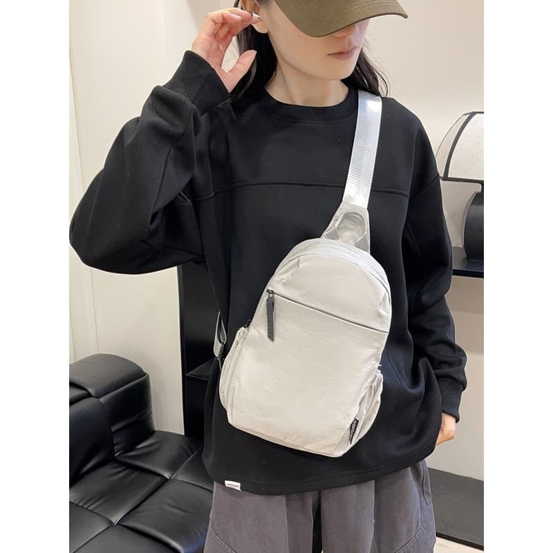 Bolsa mensageiro feminina Casual estilo simples 2026 novo estilo bolsa de peito masculina bolsa esportiva bolsa de ombro