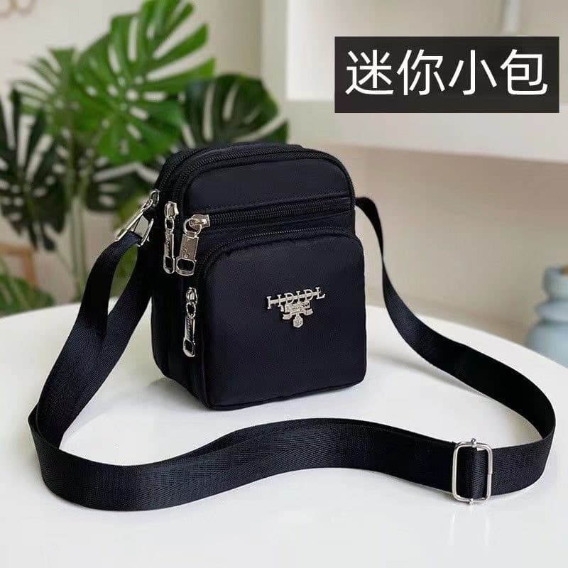Pequena bolsa de pano pequena bolsa para celular feminina novo estilo moda All-Match mãe de meia-idade bolsa Diagonal de