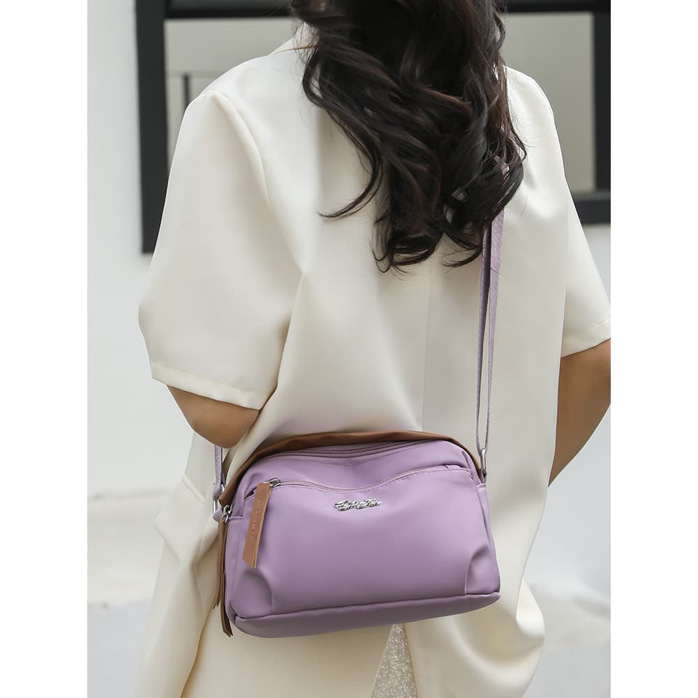 Bolsa mensageiro feminina Oxford pano bolsa de ombro mãe 2026 novo estilo Casual bolsa de pano de náilon feminina bolsa