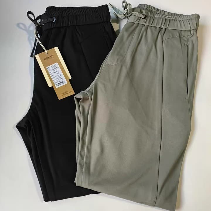 Homens primavera verão estilo cintura elástica esportes calças casuais calças compridas masculinas calças de moletom ret