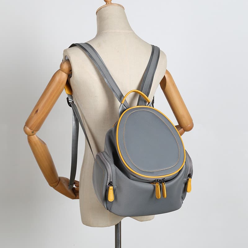 Coreano coreano contador mochila feminina High-End nicho grande capacidade balde saco de viagem leve simples estudante s