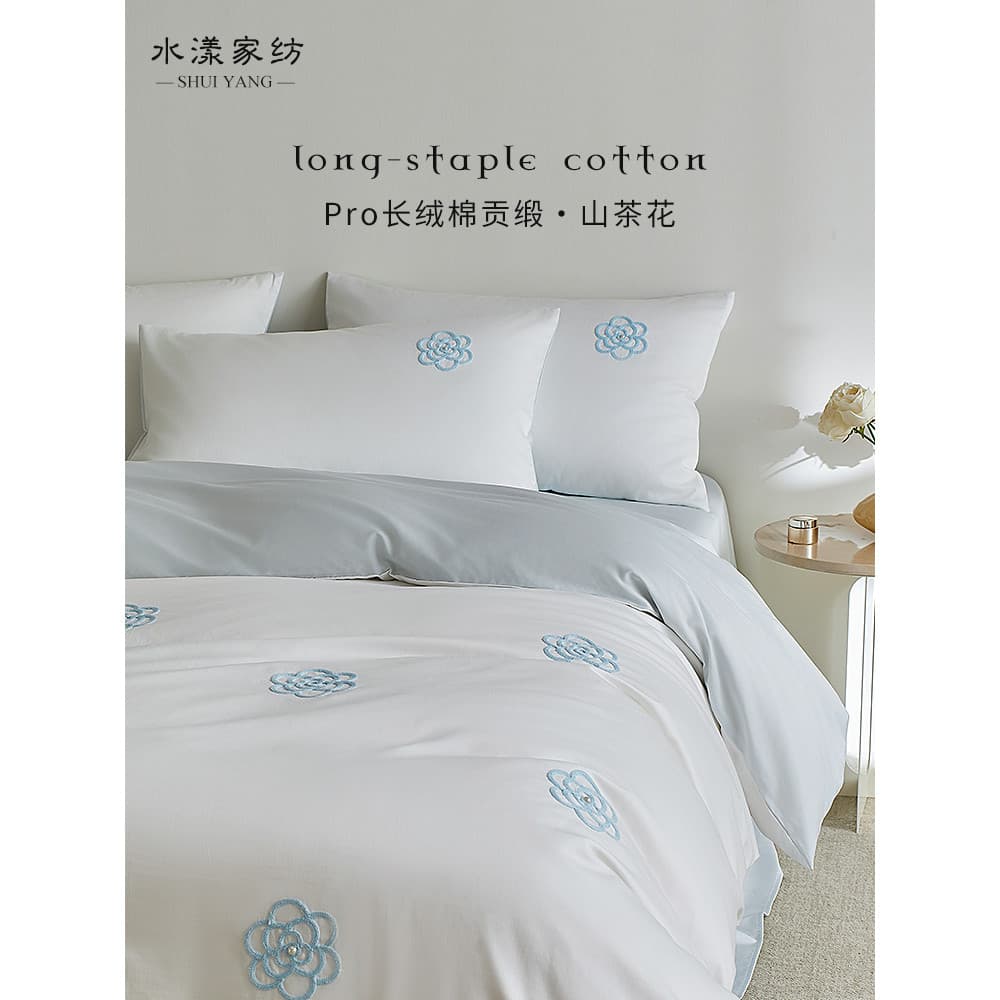 Linda cama de algodão de fibra longa 100Pro conjunto de quatro peças High-End camélia bordado capa de edredão lençol de