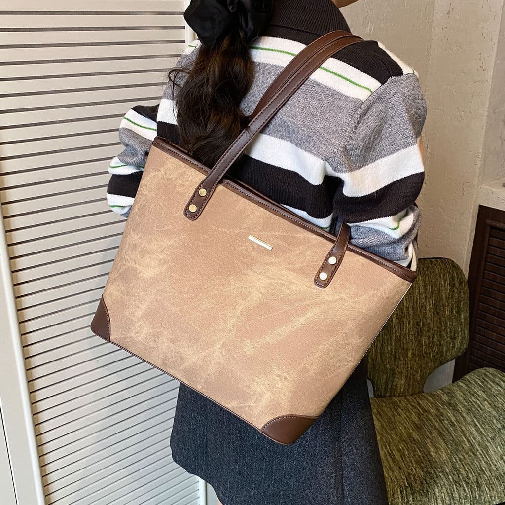 Moda Casual grande capacidade diário Commuter bolsa de ombro 2025 novo estilo bolsa feminina temperamento portátil na mo