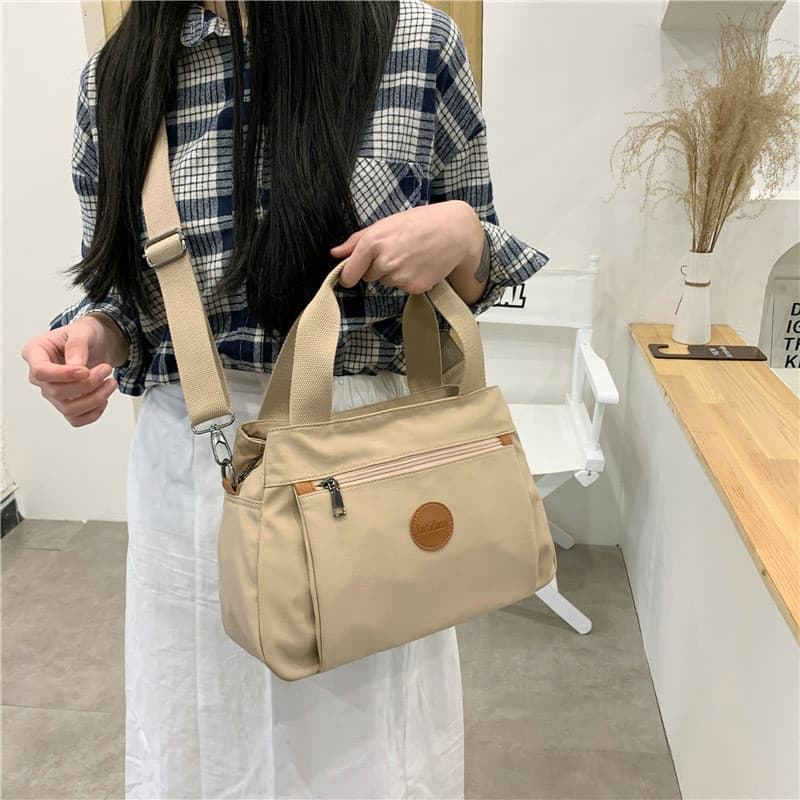 Bolsa feminina 2025 moda All-Match Casual Multi-compartimento bolsa de lona bolsa feminina portátil bolsa de ombro bolsa