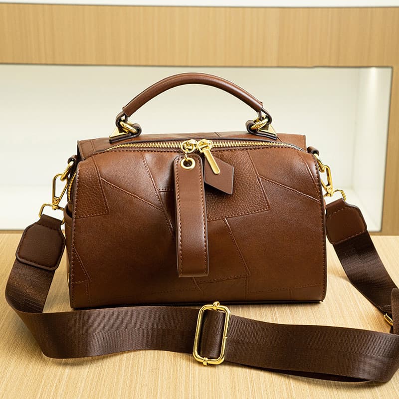 Hong Kong autêntico couro genuíno feminino mensageiro Commuter saco 2026 novo estilo moda Retro elegante portátil Boston