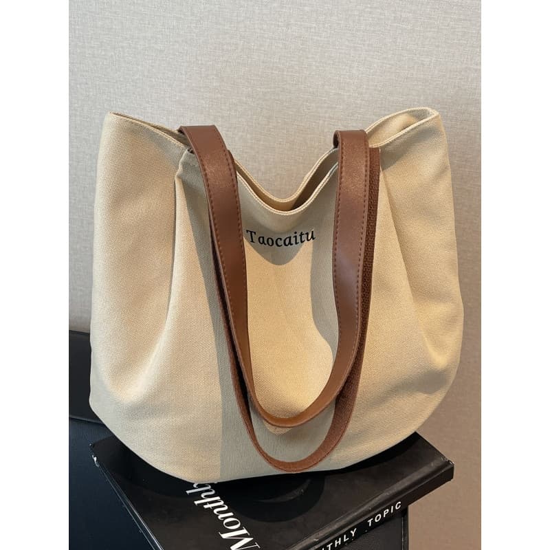 Simples versátil lona sacola feminina 2026 novo estilo moda Casual Commuter saco grande capacidade classe bolsa de ombro