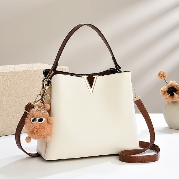 Bolsa feminina 2026 novo estilo Casual Commuter bolsa elegante All-Match um ombro saco do mensageiro nicho textura balde