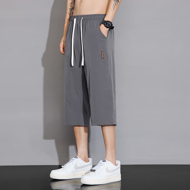 Shorts respiráveis de seda gelo fino 2025 verão novo estilo juventude solto na moda calças casuais cortadas retas