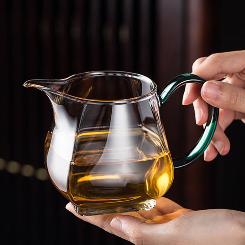 Utensílios de chá em vidro borossilicato, transparentes, de fundo espesso, coloridos, com uma alça de xícara elegante.