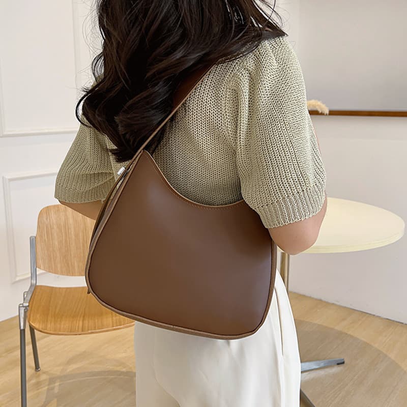High-End saco feminino 2024 novo estilo outono inverno Retro Commuter bolsa de ombro luz luxo nicho Design Baguette axil