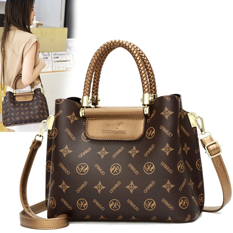 Hong Kong All-Match couro genuíno bolsa feminina de meia-idade 2026 novo estilo moda impressa bolsa luz luxo grande @