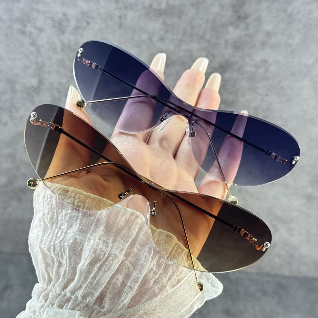 Moda europeia americana sem moldura de uma peça feminina único piloto óculos de sol High-End na moda estilo menina quent