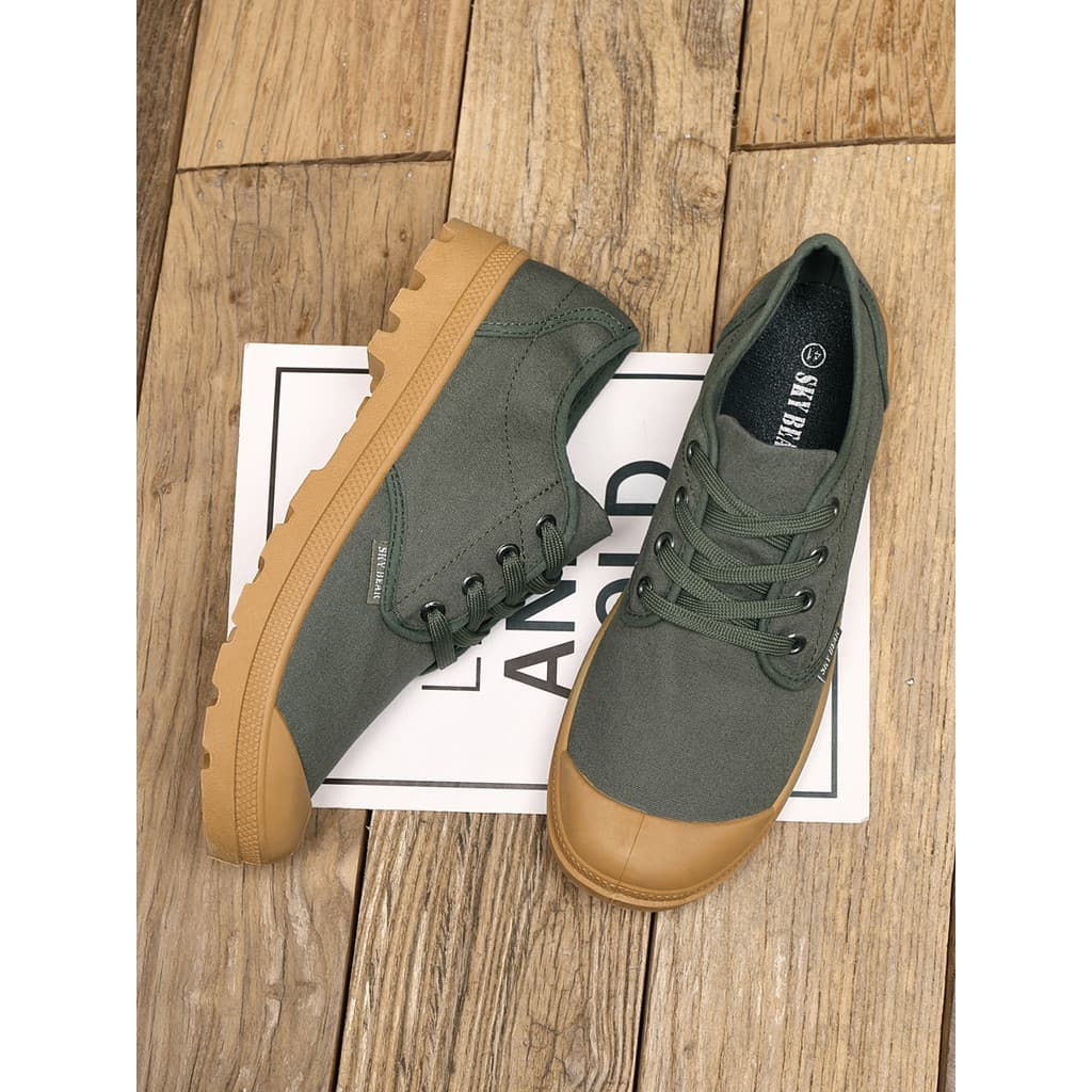 Sapatos de lona de cano baixo para exterior Macacão masculino antiderrapante resistente ao desgaste respirável anticolis