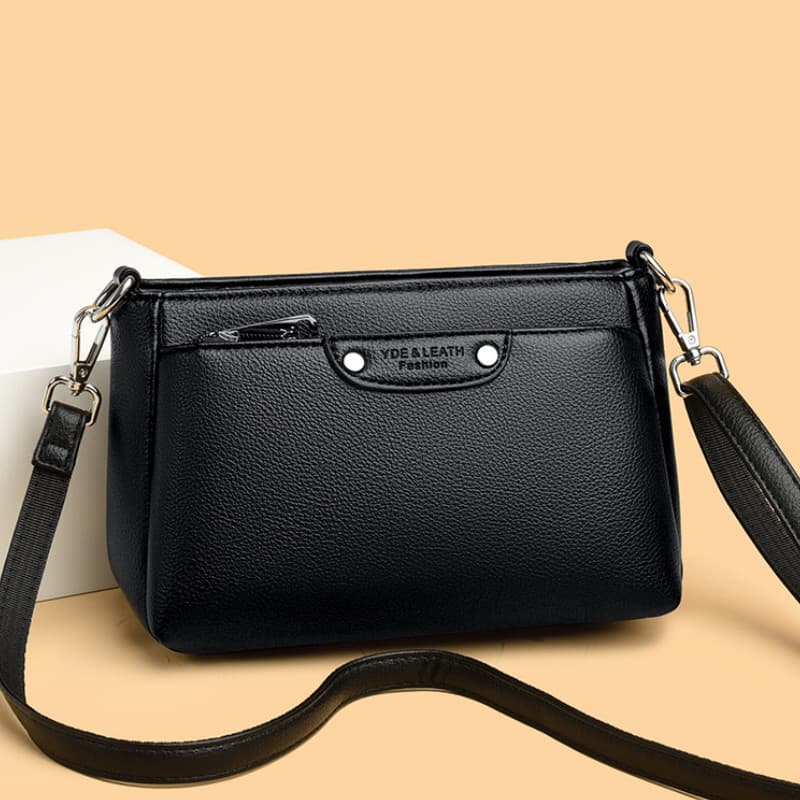 Bolsa feminina 2025 novo estilo simples três camadas pequena bolsa mãe de meia-idade couro genuíno Commuter Casual de um