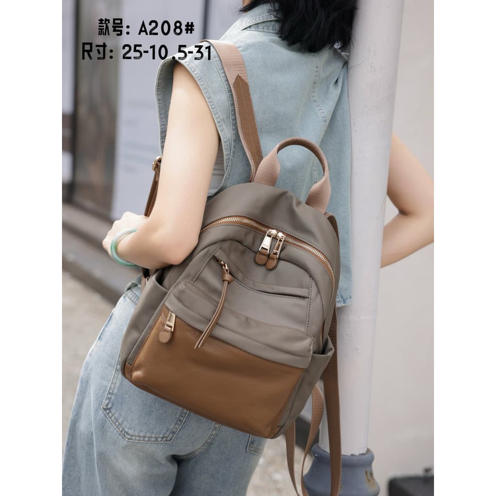 Bolsa feminina europeia Oxford pano mochila com primeira camada de couro 2026 novo estilo High-End Casual All-Match Stre