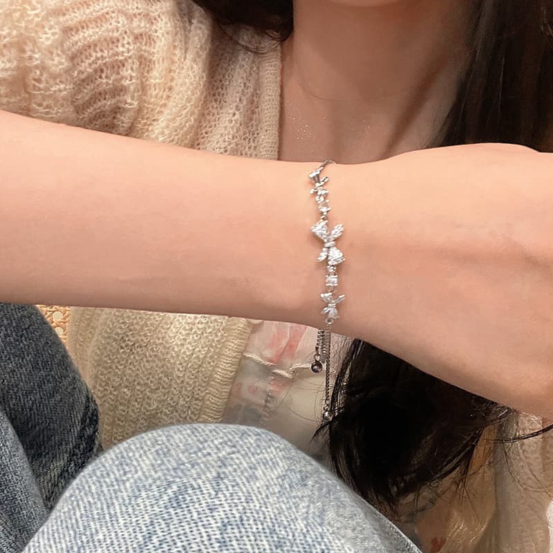 pulseira feminina pulseira Luz de luxo zircão arco puxar pulseira meninas verão ins nicho Design High-End sentimento 202
