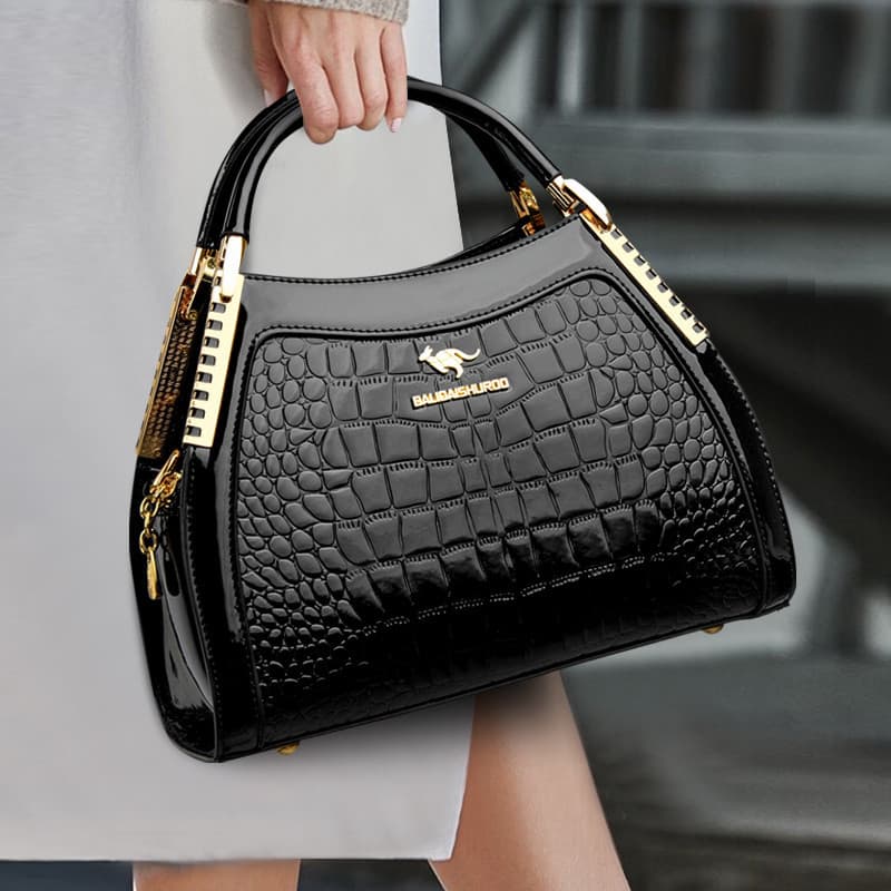 Bolsa mãe de couro genuíno 2026 novo estilo na moda bolsa de couro High-End Commuter mensageiro bolsa de ombro médio @-