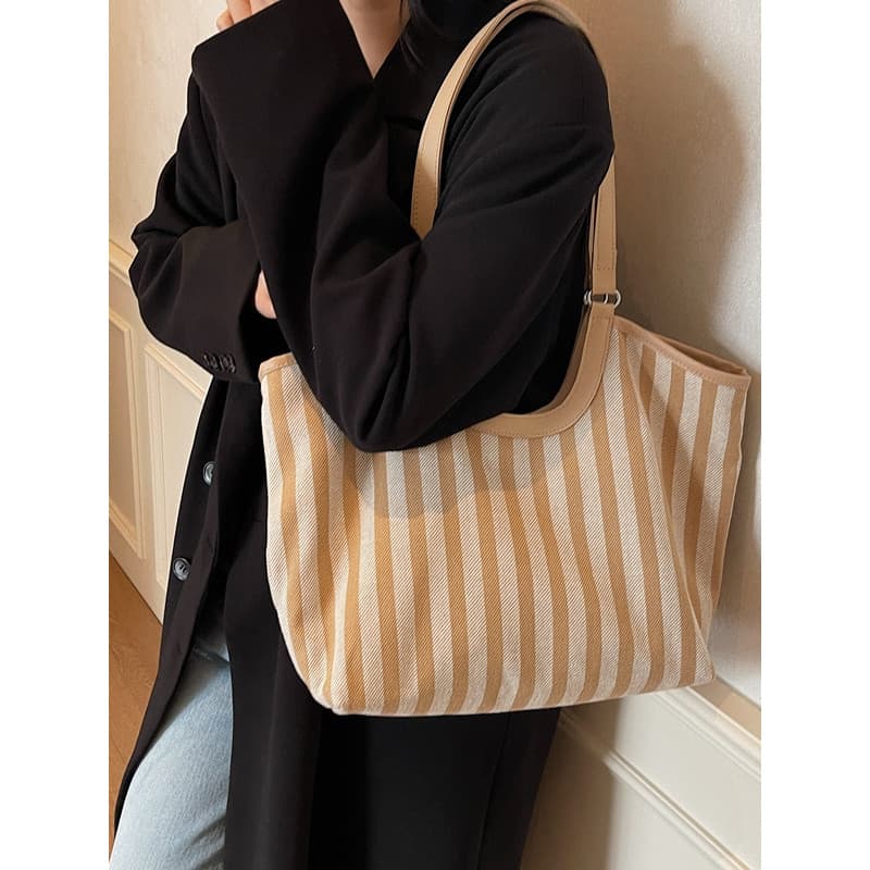 2025 novo estilo bolsa de lona feminina listras verticais simples bolsa de ombro trabalho Commuter Casual All-Match facu
