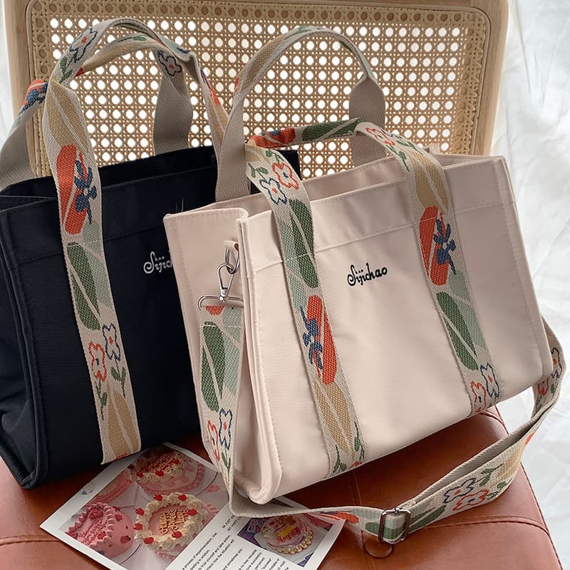 Bolsa de lona feminina 2023 novo Casual leve grande capacidade Commuter saco moda banda larga ombro saco do mensageiro