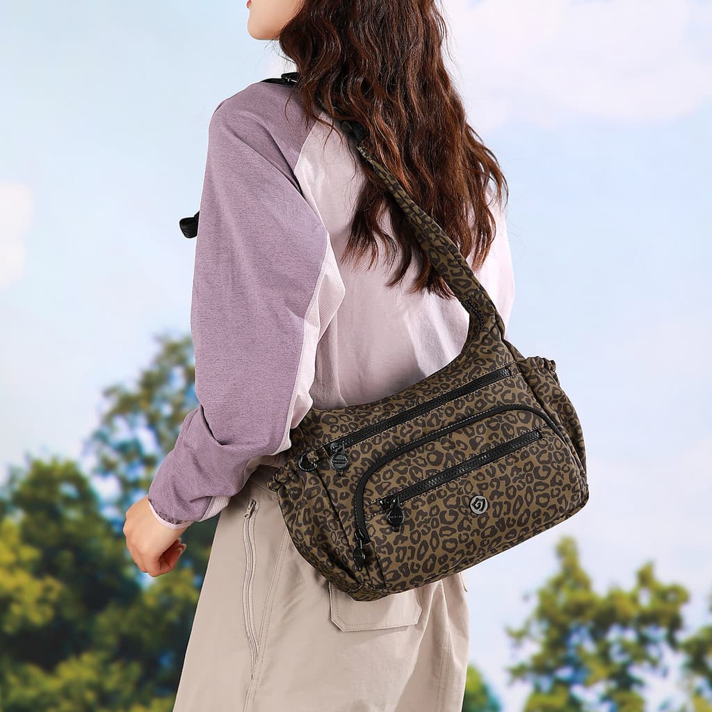 Bolsa feminina 2026 novo estilo Multi-Purpose mochila Retro leopardo impressão estilo mãe mochila de um ombro Cross-corp