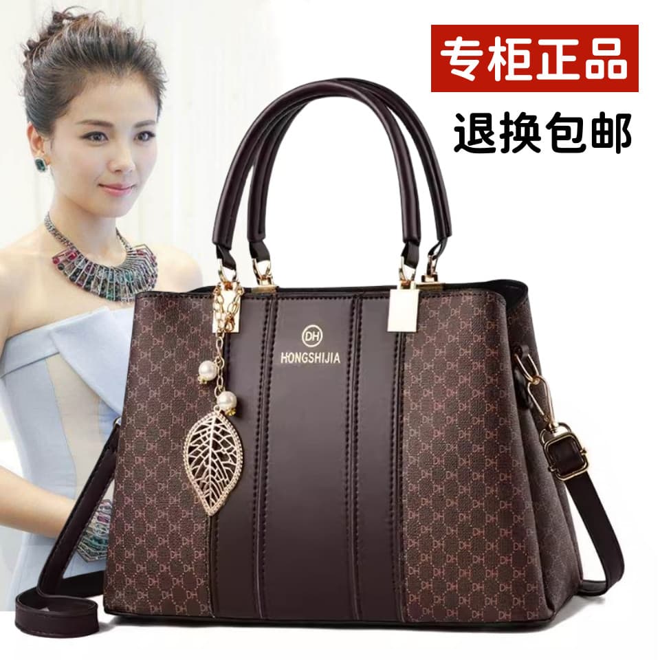 Textura de couro genuíno bolsa feminina 2025 novo estilo mãe de meia-idade saco de meia-idade idosos grande-