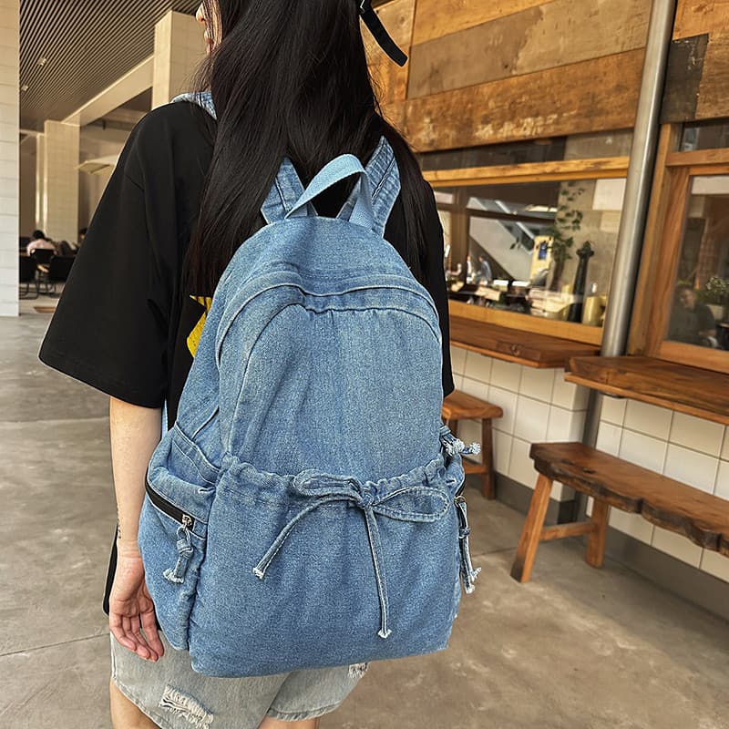 Um Denim simples grande capacidade estilo preguiçoso mochila Multi-bolso Campus grande capacidade estudante universitári
