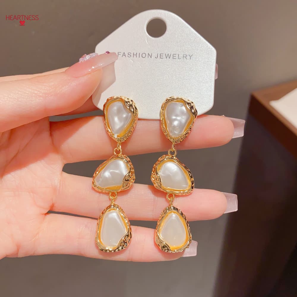 Brincos de borla longa de pérola Irregular moda única luz luxo simples Design exclusivo brincos