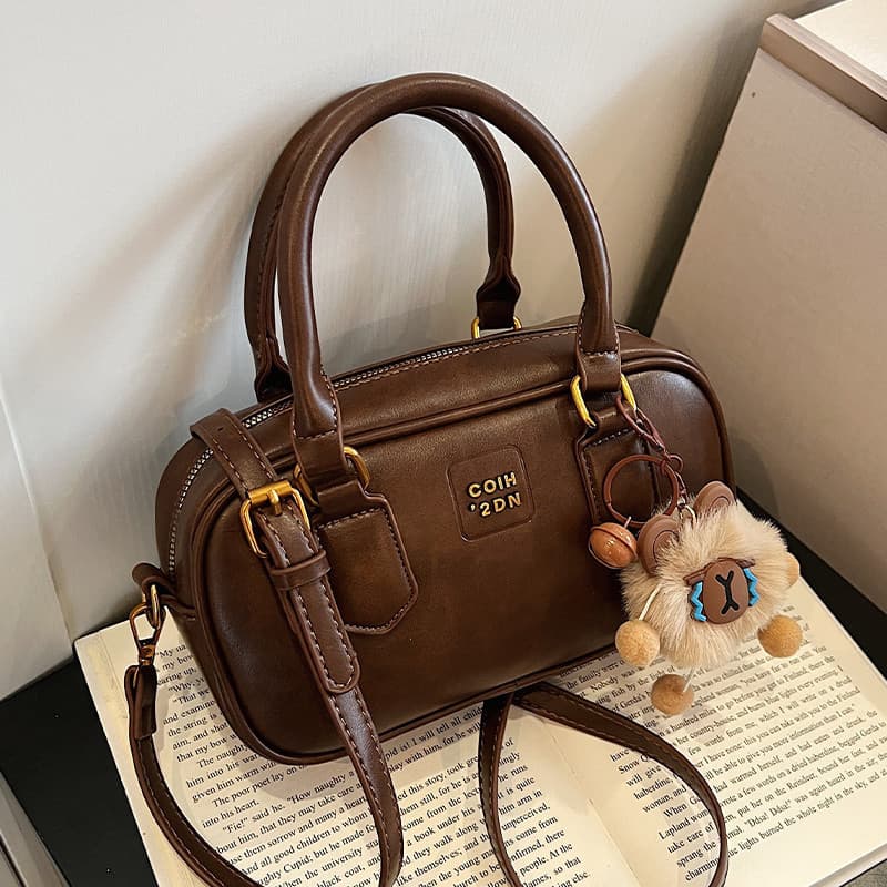 Retro mão-transporte saco de boliche feminino 2025 outono inverno novo estilo moda All-Match bolsa de ombro nicho francê