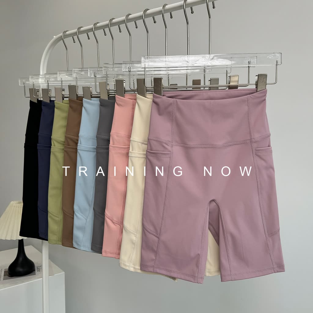 High-End sentimento sem linha embaraçosa calças cortadas cintura alta pêssego Hip bolso calças de Yoga esportes Fitness