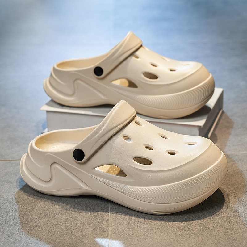 Buraco sapatos masculinos 2026 novo estilo verão de sola grossa merda-piso sentir Baotou chinelos juventude antiderrapan