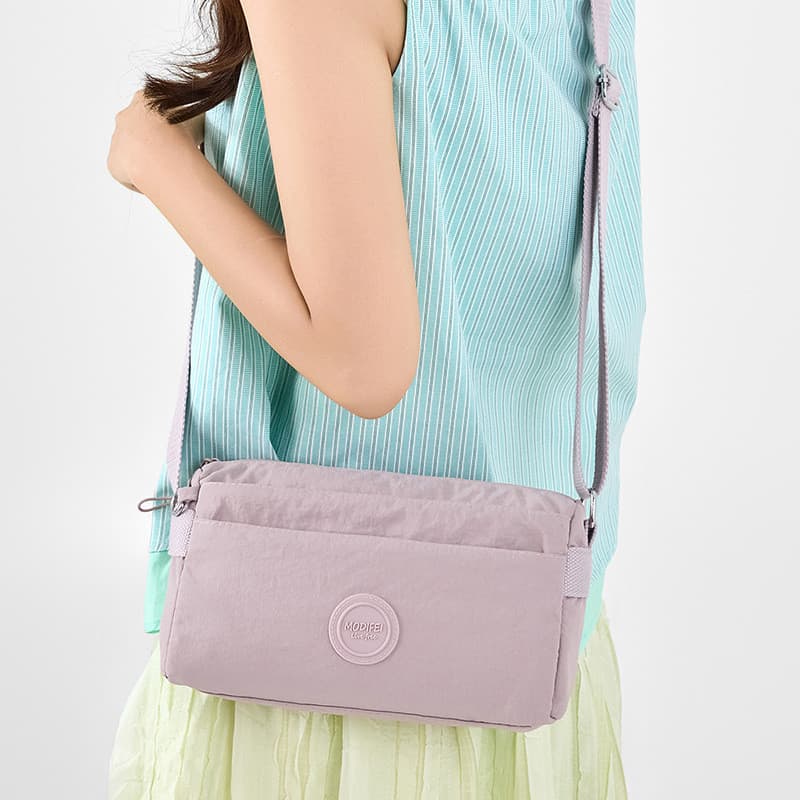 Pano de náilon saco do mensageiro de um ombro feminino novo estilo All-Match Casual mochila moda Multi-compartimento sac