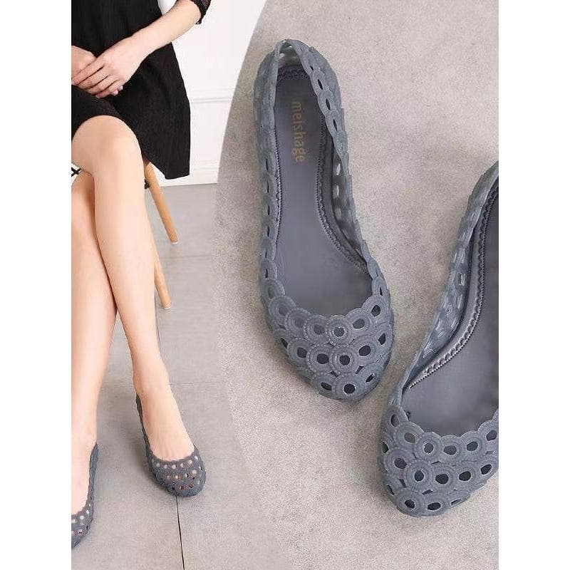 Baotou sandálias femininas verão novo estilo oco buraco sapatos planos de geléia de cristal sapatos de praia Anti-desliz