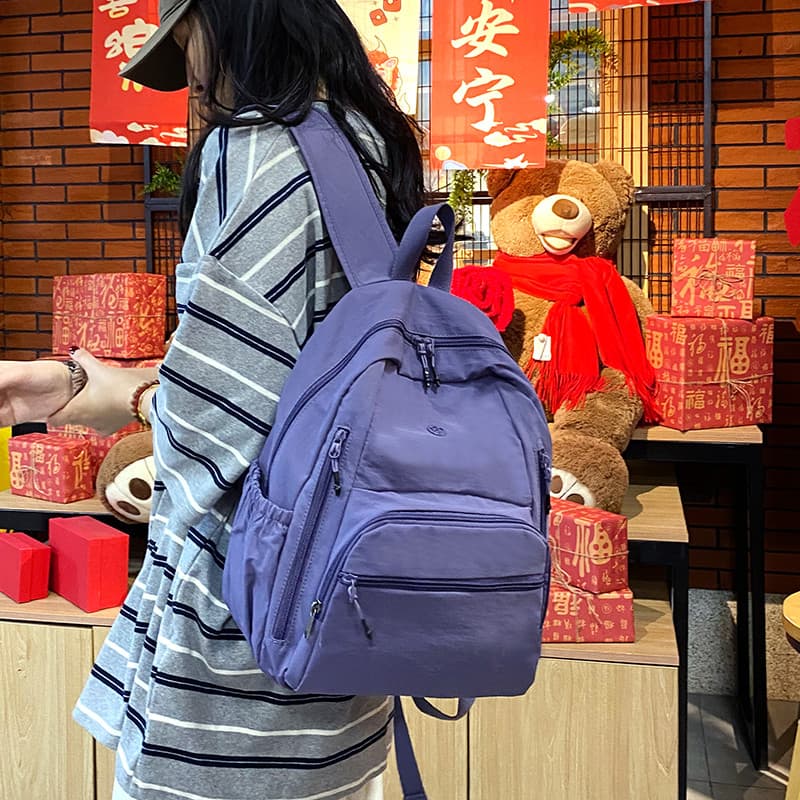 2026 senhoras novo estilo mochila leve repelente de água pano de náilon mochila de viagem diário Commuter saco de comput