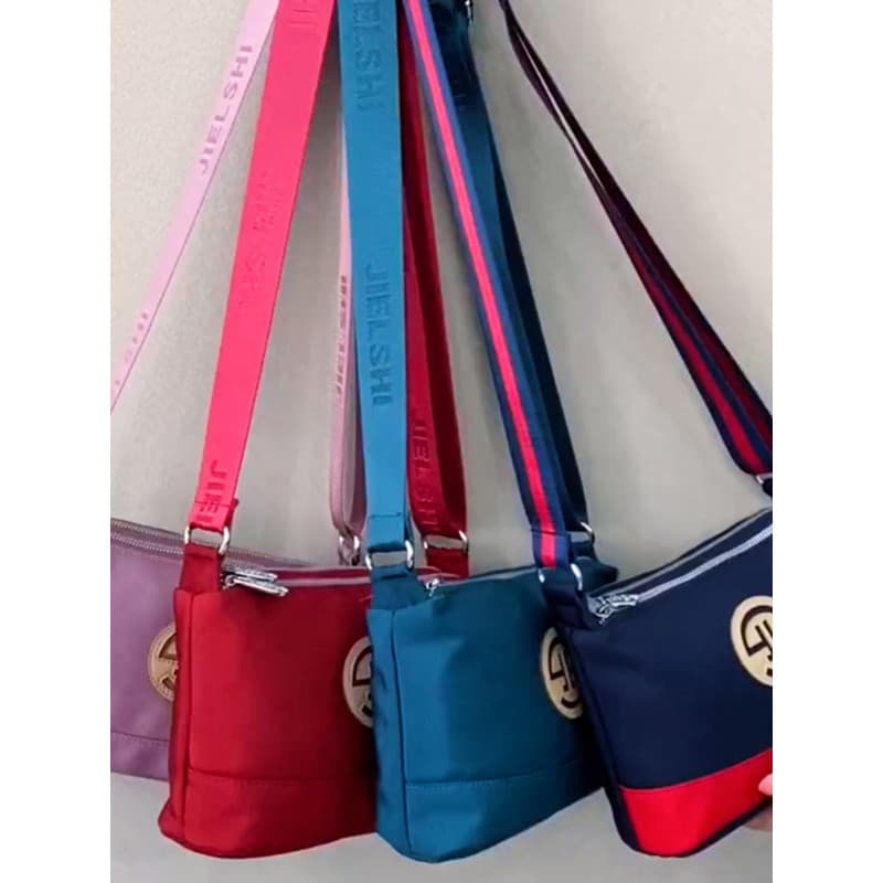 Bolsa de pano multicamadas feminina 2024 novo estilo bolsa mensageiro feminina estilo mãe Oxford pano à prova d'água bol