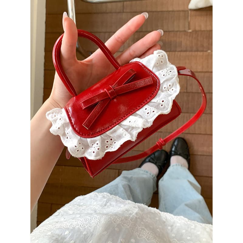 bolsa femenina bolsa transversal feminino bolsa Arco laço portátil pequeno saco feminino 2025 novo estilo verão