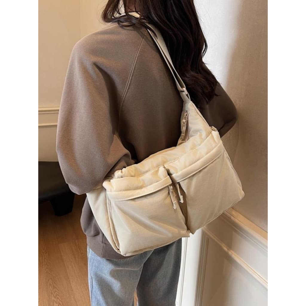 Versão coreana Casual náilon pano mensageiro saco novo estilo de grande capacidade Multi-bolso classe na moda bolsa de l
