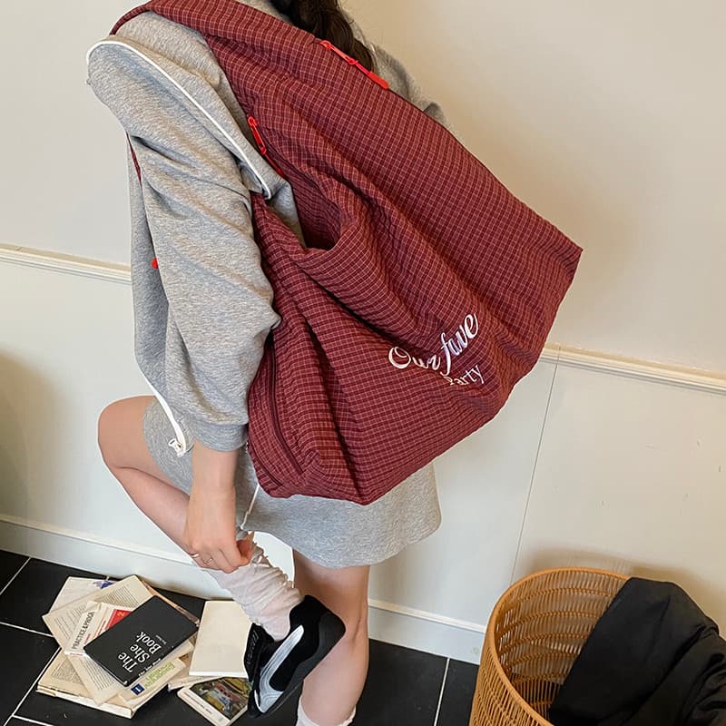 Bolsa de lona vermelha feminina 2026 novo estilo grande capacidade preguiçoso solto Commuter saco estudante festa viagem