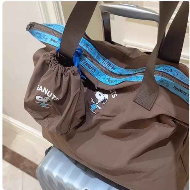 Snoopy carrinho bagagem adicional saco portátil dobrável saco de viagem grande capacidade de curta distância das mulhere