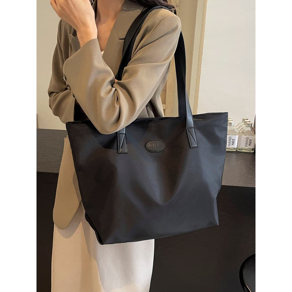 Commuter sacola de grande capacidade feminina 2025 primavera outono novo estilo simples All-Match bolsa de compras bolsa