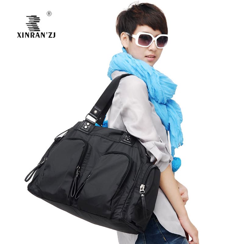 Versão coreana náilon saco impermeável de curta distância viagem lazer grande saco Multi-bolso grande capacidade de um o