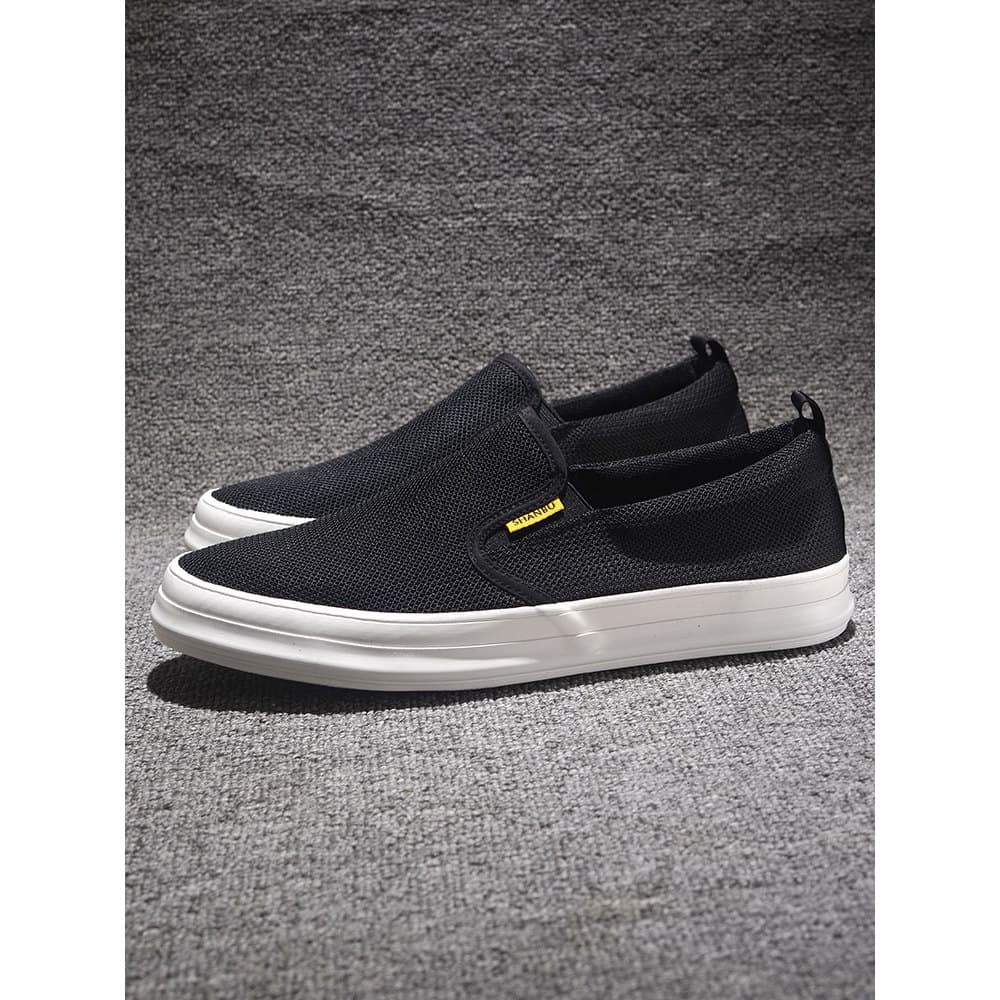 Sapatos de pano de malha masculino 2025 verão respirável um Pedal oco voando tecido malha sapatos preguiçoso velho pequi