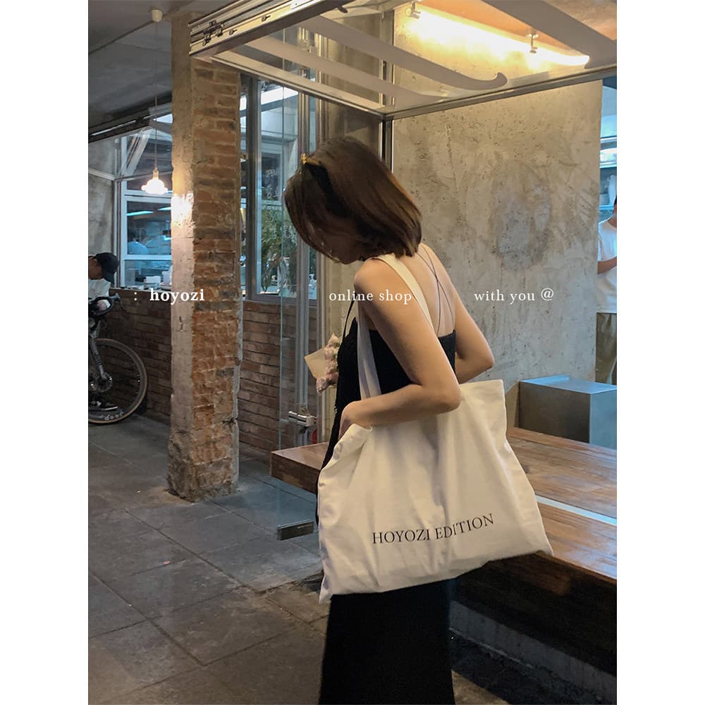 [Bolsa Xiaoyoujia] Bolsa de lona HOYOZI Bolsa de compras branca de verão Bolsa de ombro leve Textura preguiçosa
