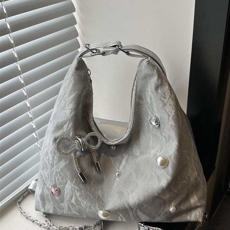 Primavera verão Retro grande capacidade saco feminino 2025 novo estilo Commuter mochila moda de um ombro mensageiro saco