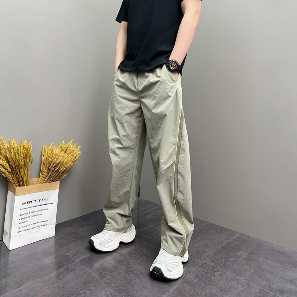 2026 verão Street Wear versão coreana rufião bonito listrado juventude solto Harem ins americano calças masculinas de pe