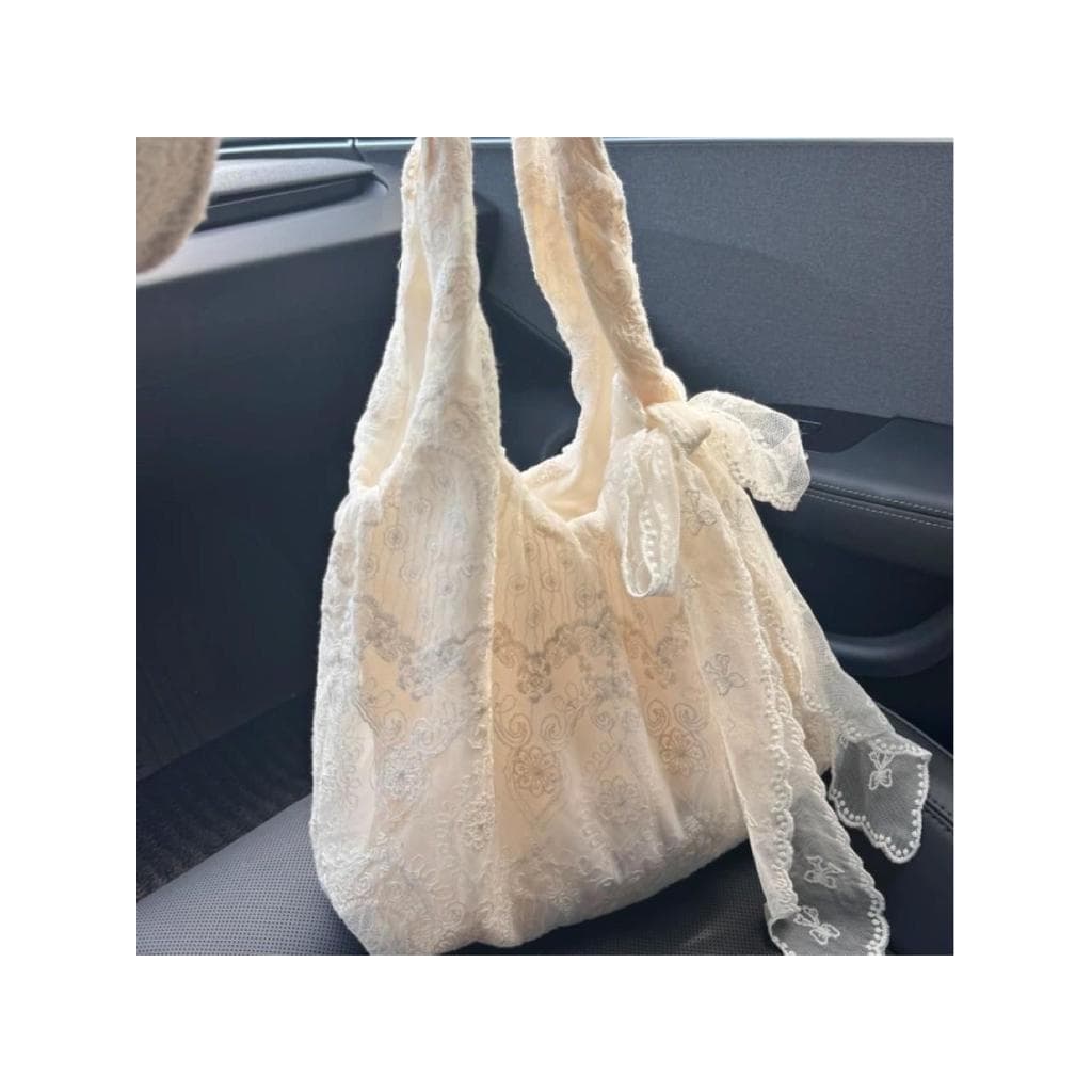 Estilo coreano fresco laço flor bolsa de lona feminina 2026 novo estilo grande capacidade de um ombro sacola Commuter ax