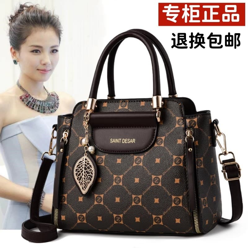 Hong Kong autêntica luz luxo bolsa feminina moda novo estilo couro genuíno mãe de meia-idade grande capacidade impressa